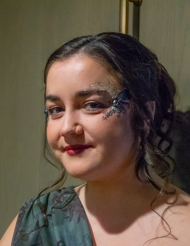 A woman in Marin, California, wearing a hand made jewel cluster from the Bling Bar